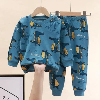 Pyjama bébé à motifs dinosaure bleu sur cintre