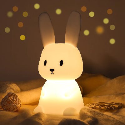 Veilleuse bébé en forme de lapin diffusant une lumière douce